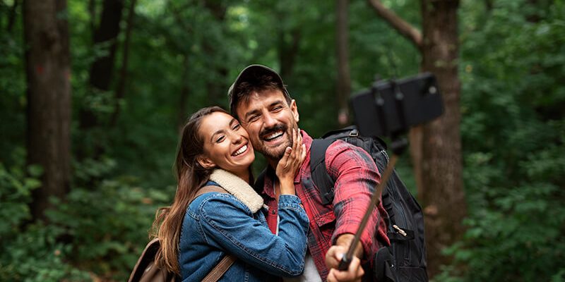 happy-romantic-couple-traveling-together-nature